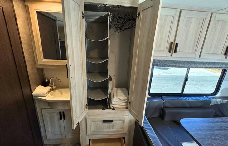 Added hanging organizer, set of towels included.