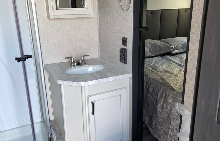 Full Bathroom with tall shower.