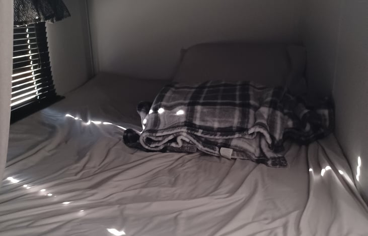 Up close view of bottom bunkbed.