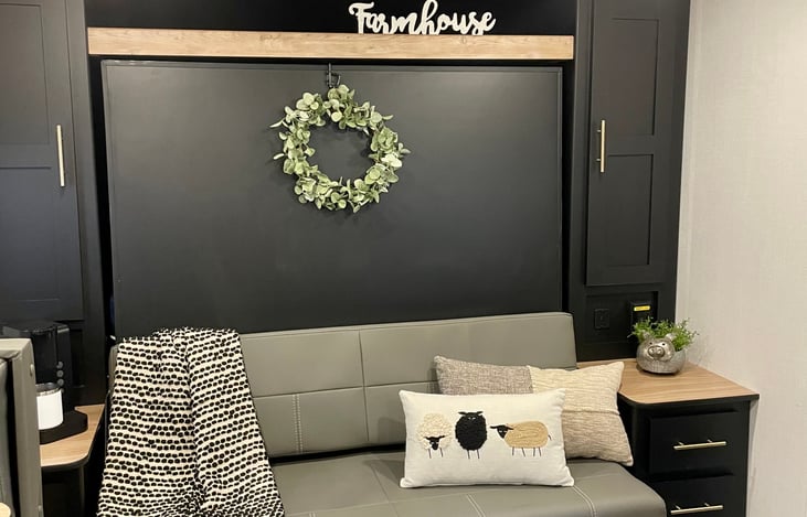 Couch -64” easily pulls down to a queen-sized bed.