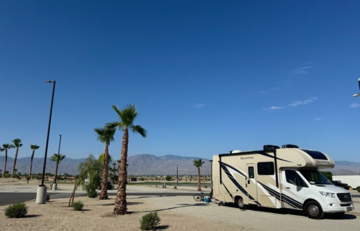 View of the side of the rig with the awning retracted. 

This park is in Coachella, California.
