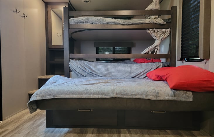 Jack-knife bed folded out