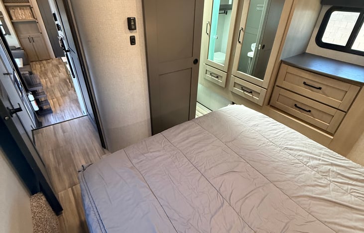 Main bedroom with plenty of closet and drawer storage.