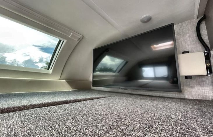 39" TV and skylight window