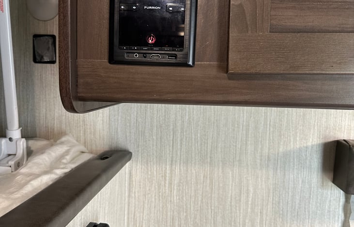 Radio that connects inside or outside and also hooks up to your phone.