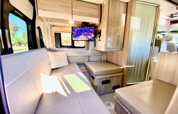 Enjoy the swing-away TV on those rainy nights.  Includes Apple HDMI adapter to mirror your phone on the TV, or just use the roof amplified antenna!