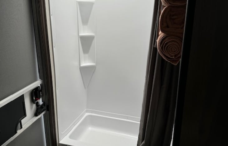 The shower provides campers the privacy they're used to at home :)