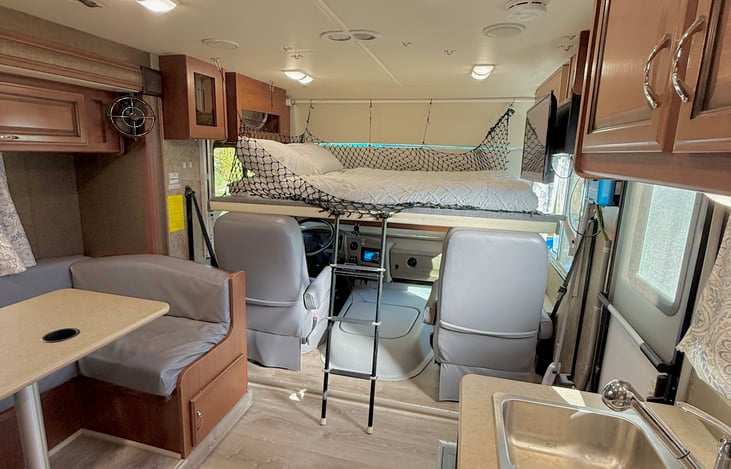 Overhead bunk. Sleeps 2. Safety netting to prevent falling out of bed.