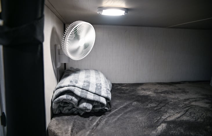 Stay cool and comfortable on hot days with the added fan in the bunk room, ensuring a refreshing breeze and a restful sleep.