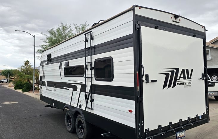 Sleek exterior with rear toy hauler access