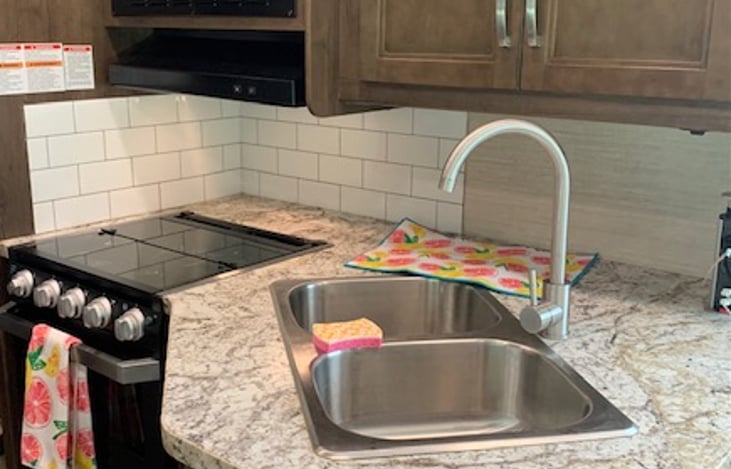 kitchen with stove, oven and microwave