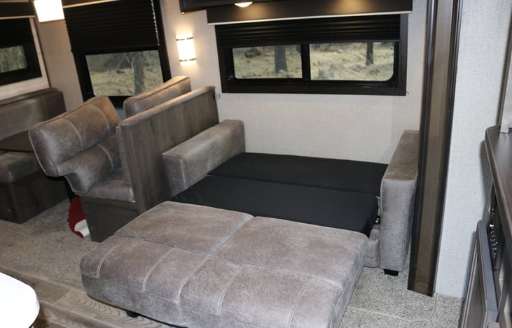 Couch converted into a bed. Full fold out.