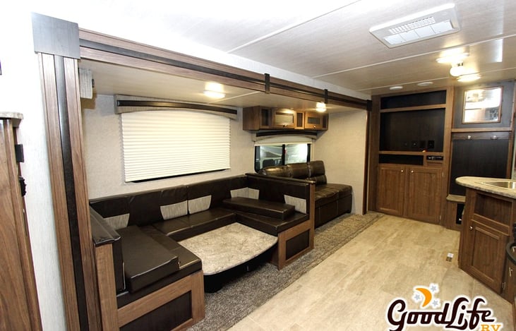 same set up as my camper just instead of the entertainment center we put shelfs up and turned it into a bar. there are shelfs underneath and a radio that has speakers in and outside the camper.