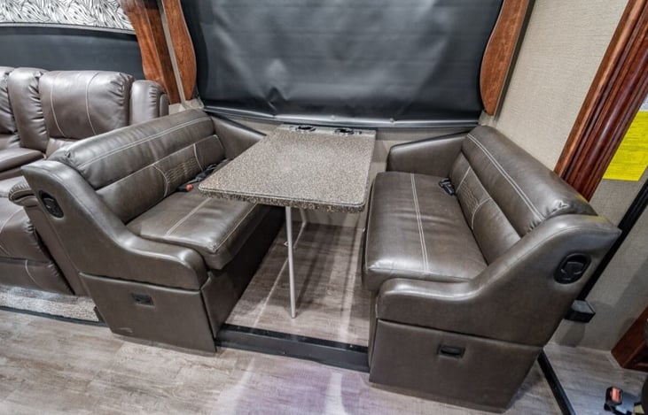 Dining table converts to a full size sleeper.