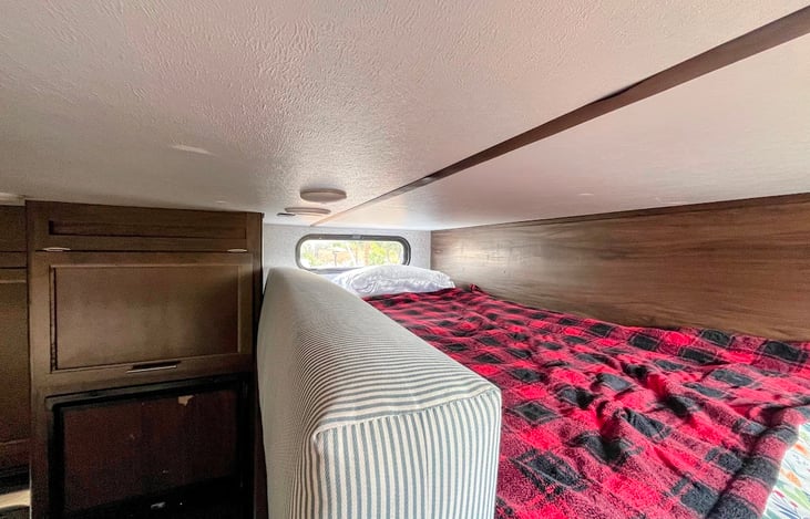 Cozy loft space. Sleeps one. Our one likes to use the cabinet next to store belongings or snacks.