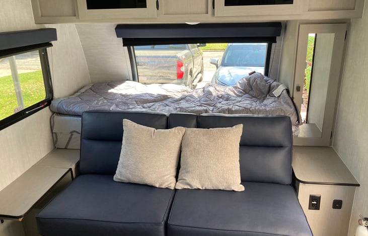 Couch folds down to make room for the queen bed to open up.