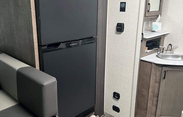 Refrigerator - 6 cu. ft. runs off shore power or battery.