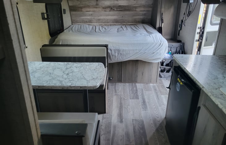 Camper Queen and dinette that turns into small bed