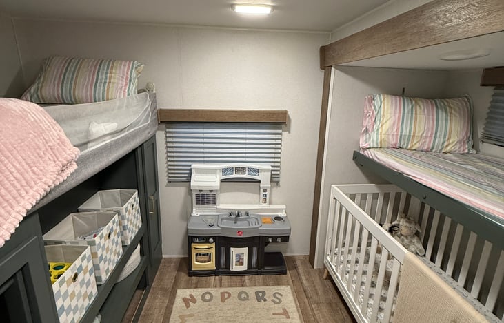 Bunk house! 3 beds, toys, books and more for the young ones!