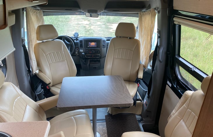 The swivel chairs and removable table create a nice game and meal time area