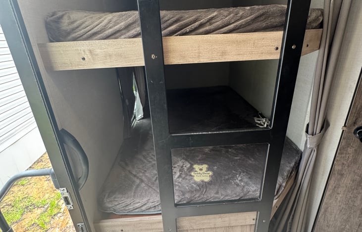 Bunk beds with open storage underneath