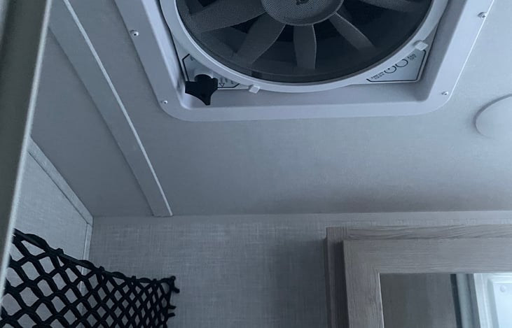 Bathroom fan and storage, top shape