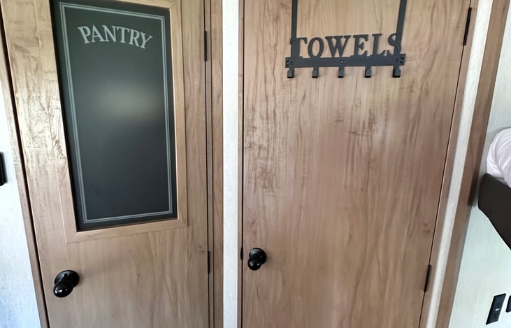 Large pantry and door to bathroom