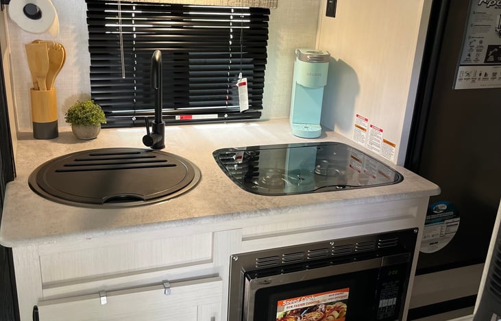 Kitchen is stocked with everything you’ll need for your camping trip.