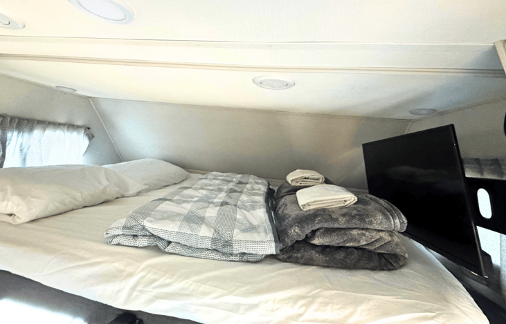 Upper bunk can sleep up to two adults, additional bedding can be added as an add on, see add on's section.