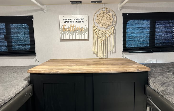 The bunks in the back sleep three. Kids love this area!!