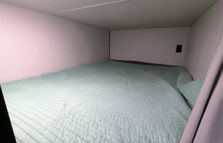 Large cozy bunks with USB charging ports.