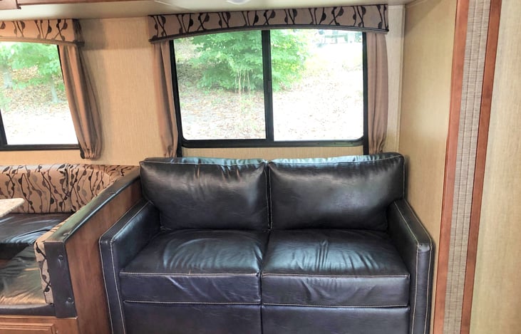 Soft couch - Kick back, watch some TV, and relax in the A/C!