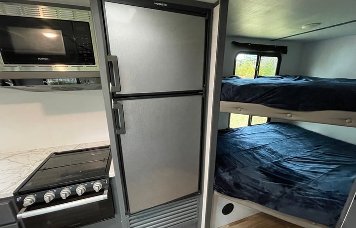 Large refrigerator and separate freezer.