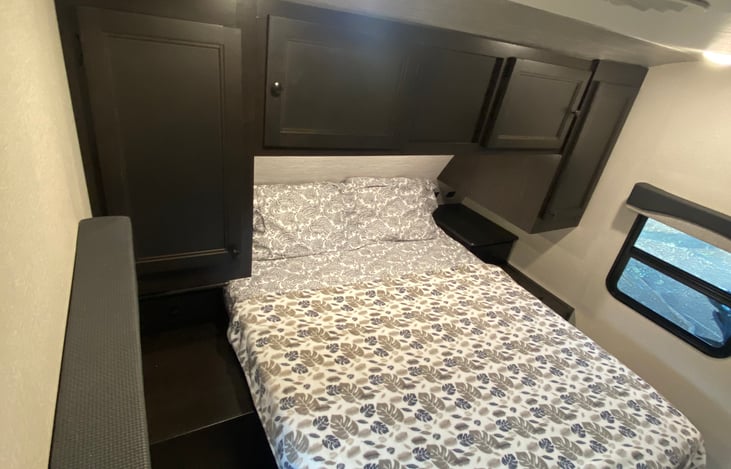 Gorgeous private master queen suite.  Storage above and manual lighting when required under storage cabinets.