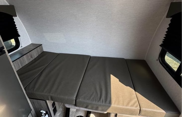 Table converts to second bed.