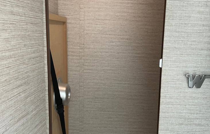 Inside the hanging clothes closet, also the table storage area.