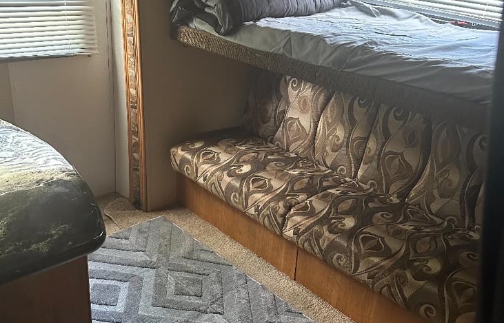 BUNK HOUSE WITH FOLD OUT FULL SIZE BED AND TWIN BUNK ABOVE