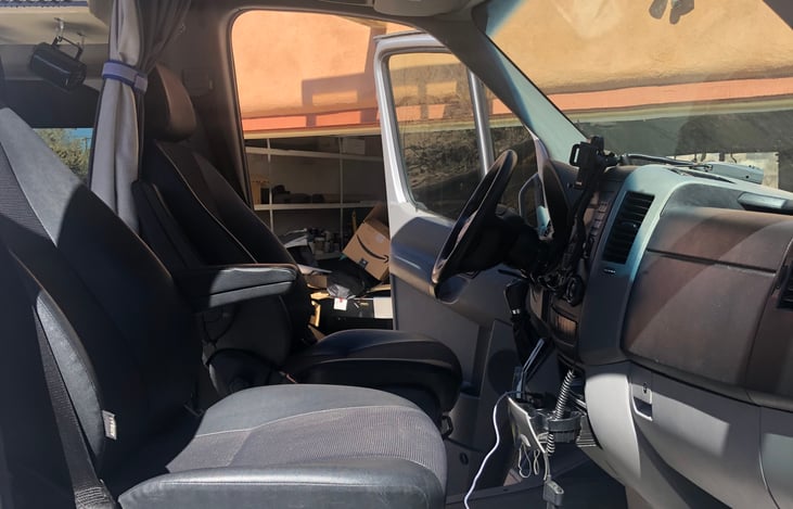 Large clutter free can area. We did not place a fridge between the front seats, allowing easy access to the rear area on the go.  Super nice to walk around in the go.