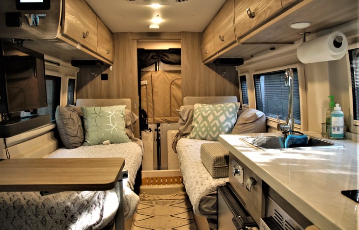 Two twin beds or you can make it a King size bed.