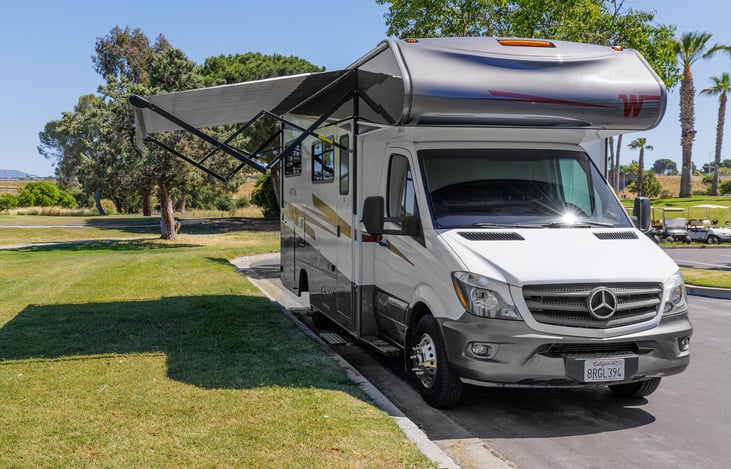 2020 Winnebago 24F exterior- Awning out.