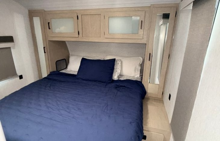 Queen bed with extra storage .