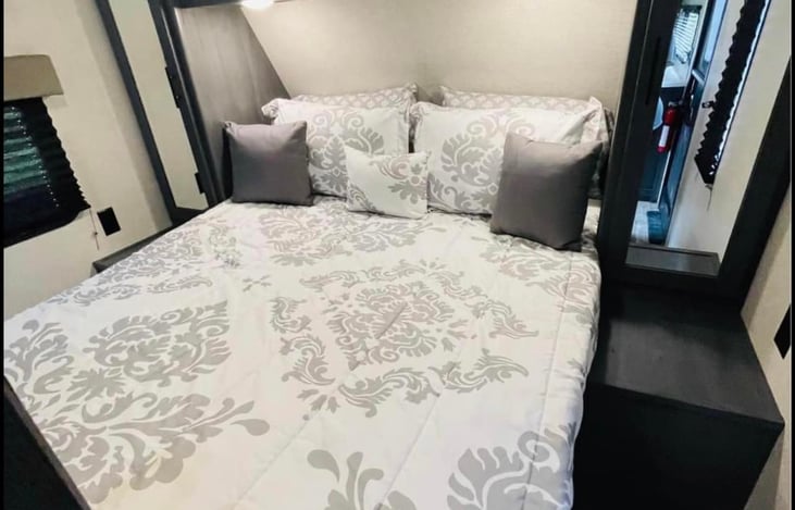 This is the main bedroom. The factory mattress has been replaced with a full size queen that is very comfortable.