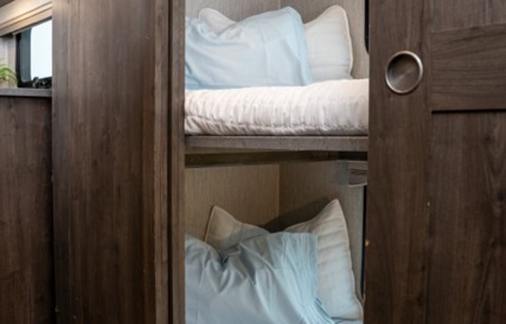 bunkhouse can be utilized for sleeping, or as an office, or as a large closet depending on your travel needs.