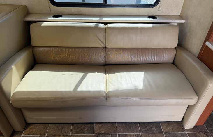 Beautiful couch that goes out to a bed as well as seen in next picture