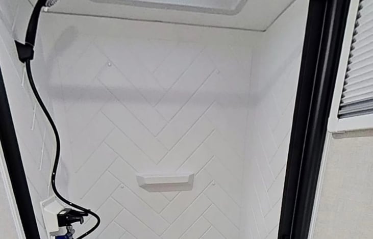 Spacious shower in full bathroom