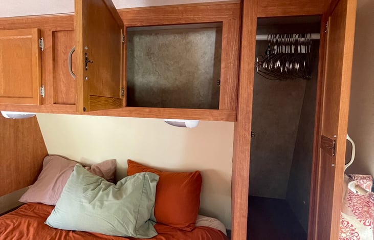 Plenty of storage space for clothing and personal belongings. Metal hangers provided.