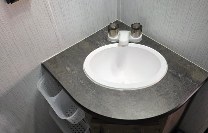 Bathroom Sink
Trash Can available in cabinet under sink