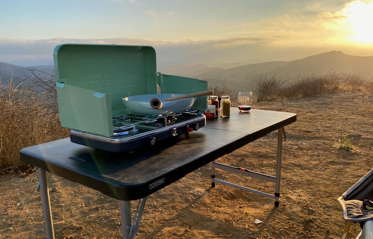 The adjustable table is great for outdoor dining and cooking. Camp stove available upon request.
