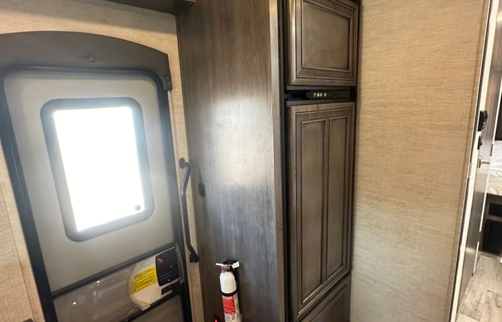 The fridge and freezer works on both electric and propane.