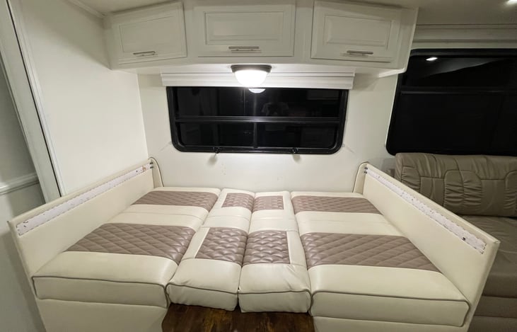 Dinette turns into a twin sized bed... please bring your own bedding.